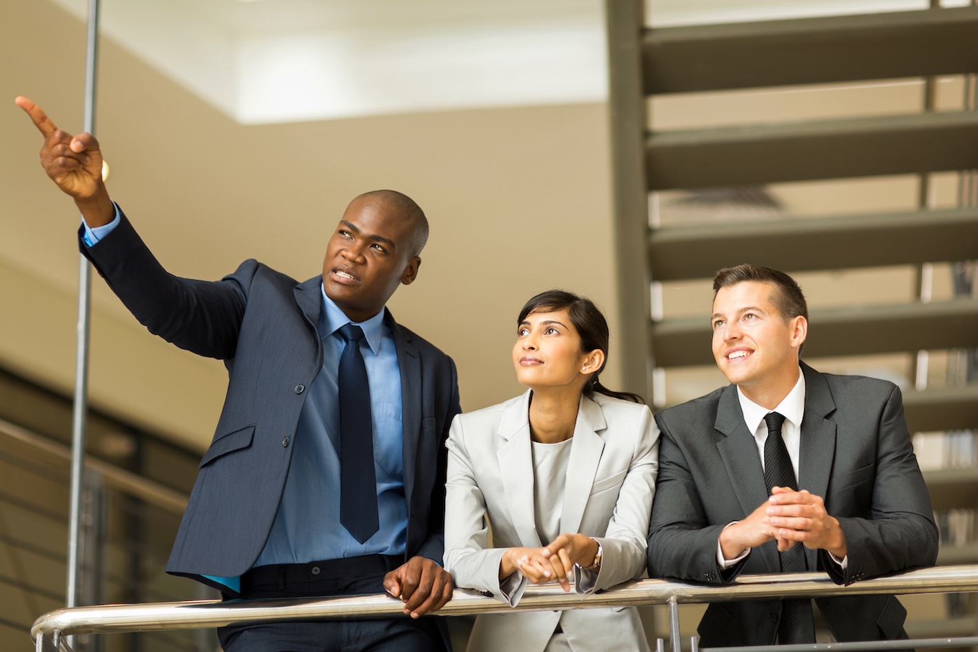 successful business group discussing work in modern office